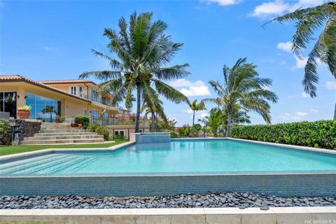 Price reduction for next owner to make any renovations. View! View! View! Spectacular ocean and Diamond Head views from this stunning residence. Estate sized rim lot - 23,849 square feet - level, fully landscaped gardens in the Pointe at Hawaii Loa R...