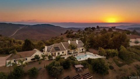 Welcome to 29309 Integrity Court, a prestigious estate offering the epitome of luxurious living. Nestled at the end of a tranquil cul-de-sac and set on approximately 5 acres, this magnificent home boasts breathtaking big sky and mountain views, along...