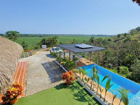 Très belle finca près de la rivière Don Diego dans le département de Magdalena à 1 heure de Santa Marta sur la route de Riohacha, située sur le côté droit de la route dans les contreforts de la Sierra Nevada de Santa Marta, avec une vue spectaculaire...