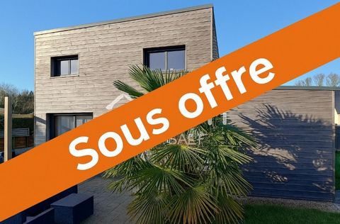 Au calme, dans une résidence récente, construction en bois