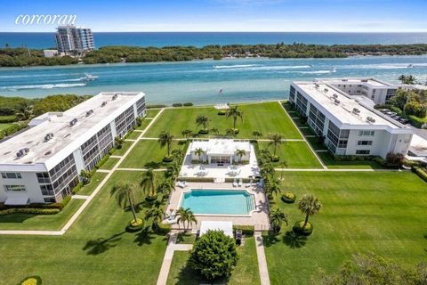 Rarely available, this Southeast corner, second floor, 3/2 direct Intracoastal Condo offers impressive unobstructed views across crystal turquoise water to Coral Cove, a dedicated oceanfront preserve. Travertine floors throughout the main living area...