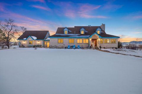 This prime equestrian estate of nearly 35 acres is completely surrounded by 1200 acres of conservation easement land. The unobstructed views of Meeker and Longs Peak will be yours to enjoy! Ride your horses year round in the 90x120ft indoor arena wit...