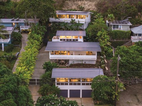A tropical oasis nestledjust a short walk away from the pristine white sand and turquoise waters of Lanikai Beach, offering an unparalleledexperience of luxury and relaxation. Comprised of three separate structures- two newly built in 2018, along wit...