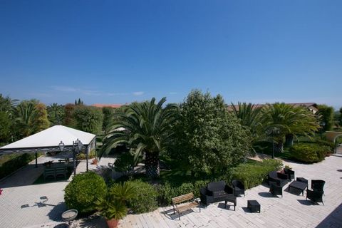 Live a dreamy vacation in this holiday home on a beautiful estate in the Italian TrinitaPoli, close to Adriatic Sea. You have access to a communal swimming pool. Ideal for sun vacations with your partner. The property is a 15-minute drive from the Sa...
