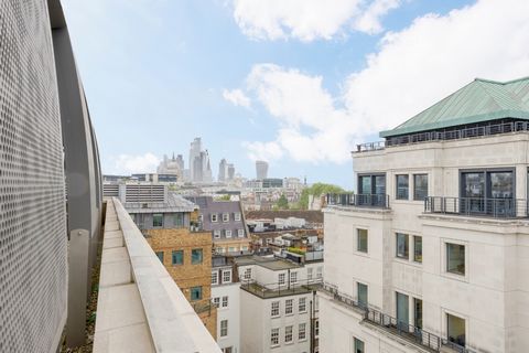 This is a truly stunning sixth floor apartment with superb city views close by to the River Thames. It has a contemporary, open-plan interior with a large dual-access outdoor terrace. The apartment has a spacious living and dining room as well as a l...