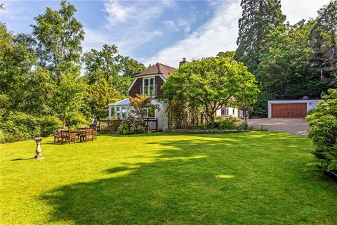 Discover a magnificent detached family home delightfully situated amidst serenely tranquil and well-established gardens, providing a haven for wildlife. This prestigious residence features a superb patio and decking area, perfect for outdoor relaxati...