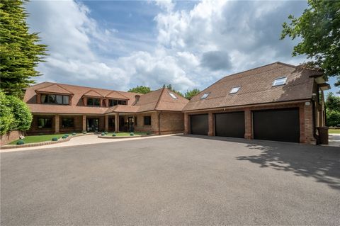Timeless, yet contemporary, home with over 10,000 square feet of living, garage and annex space, a swimming pool and convenient access to the London bound trainline at Burgess Hill. The architectural design of the home is both timeless and contempora...