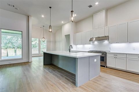 HELLO GORGEOUS! New construction by Versailles Custom Homes in Jersey Village offers 4 spacious bedrooms, 3 full bathrooms & an attached 3-car tandem garage. This *mesmerizing* home features a modern exterior & elevation, a lush lawn, mature trees, a...