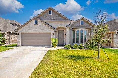 The open floor plan, modern textures, and luxury upgrades make this property stand out! This kitchen is meant for entertaining with an inviting granite island, stainless appliances, plenty of counters space and custom cabinets. The combined living sp...