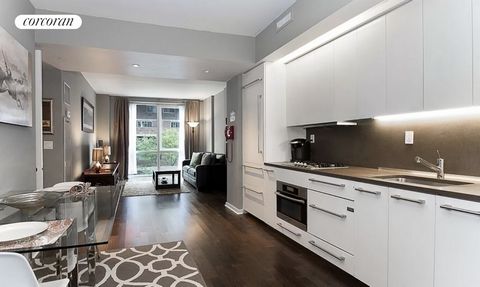 Experience luxury living in this exquisite one-bedroom residence at The Gramercy by Starck. This spacious home features floor-to-ceiling windows and dark oak wood floors. The kitchen is fully equipped with a Sub-Zero refrigerator, double freezer draw...