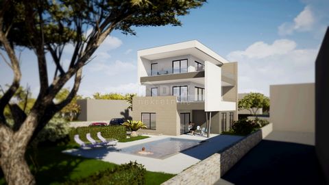 Location: Primorsko-goranska županija, Omišalj, Njivice. KRK ISLAND, NJIVICE - luxury new building in an exclusive location, 20 meters from the sea A luxury apartment for sale on the second floor of a prestigious new building in Njivice, on the islan...