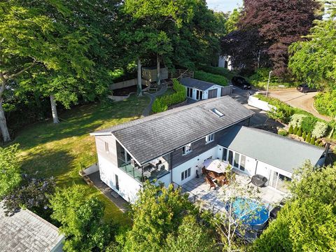 Located off Windmill Hill in a prime Launceston neighbourhood, this home offers easy pedestrian access to the town centre, Coronation Park, leisure centre, and local schools. Set back behind secure electric gates, the property has been meticulously i...