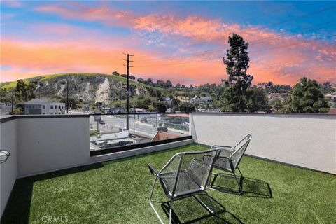Modern Marvel with a Rooftop Twist! Say hello to sleek, stylish living in this turnkey corner unit built in 2017âjust bring your toothbrush and start living your best life! With a modern vibe, rooftop deck, and a location that borders the beauty of P...