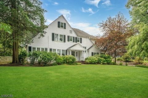 Nestled in one of Short Hills' most coveted enclaves, 59 West Road is a timeless and distinguished residence blending architectural elegance with modern convenience across four beautifully finished levels. A gracious foyer sets the tone and opens int...