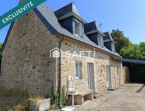 Maison en pierre dans un environnement calme et verdoyant