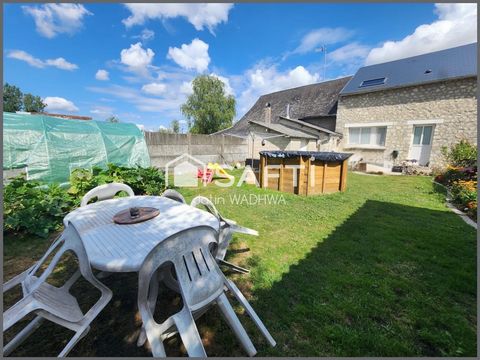 Maison rénovée avec jardin, garage et dépendances.