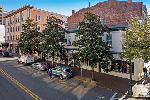 Now available! Great commercial/retail opportunity on the corner of Bull and State Street. Downstairs is currently a mix of retail and professional use. Upstairs is currently office space. Unlimited potential for condos or short term vacation rentals...
