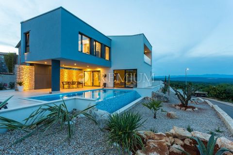 Krk, surroundings, beautiful villa with swimming pool and sea view! Villa for sale with swimming pool overlooking the sea in the vicinity of Krk. Exclusive and modern new building, 223 m2 of living space, 135 m2 terrace and 400 m2 of garden, and a be...