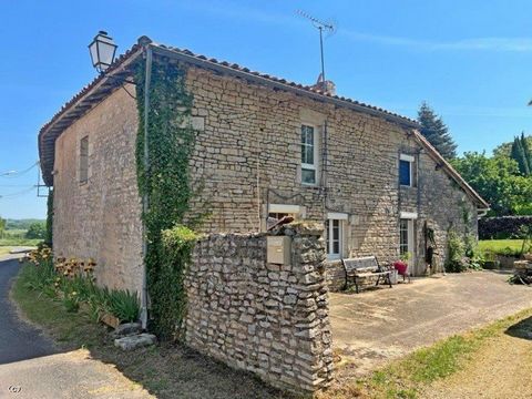 Beautiful stone house with superb views over the countryside near Nanteuil-en-Vallée. This house is full of character and originality and offers a huge living room with a superb fireplace, a modern kitchen, a large garage adjoining the living room an...