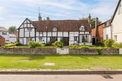 A fine Grade II listed four bedroom home with a stunning garden backing onto open fields in the desirable village of Aldbury on a plot of approx 0.3 acres. A truly wonderful family home nestled in the heart of one of Hertfordshire's most desirable vi...