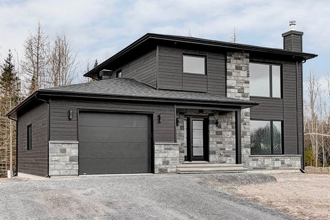 To be built in the JARDINS BOISÉS PINTENDRE: an upscale neighbourhood on the edge of Lévis, with ultra-fast access to the highway. The AÄNN model with garage is a very popular timeless model. It offers 3 bedrooms upstairs and beautiful comfortable di...