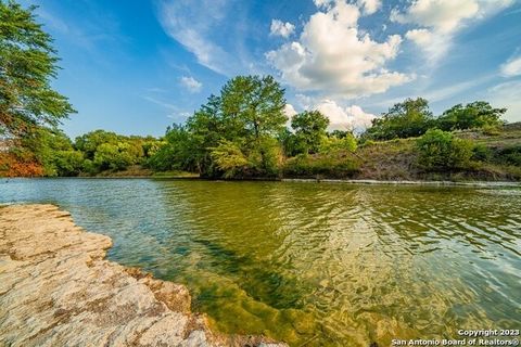 Nestled within the Hill Country, Zanzenberg River Lodge encompasses 79.49 acres and features an impressive 2800' of Guadalupe River frontage. The estate is anchored by a 4,450 sf stone home with a standing seam metal roof, ensuring durability and ele...