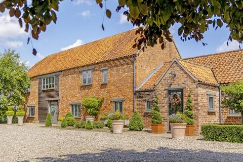 An exemplary conversion of adjoining barns, one a two storey, the other a single storey with mezzanine, is presented in immaculate order and fitted with top quality materials in a very appealing modern rustic style. With a large separate barn incorpo...