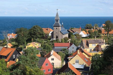 Parque de vacaciones Gudhjem & # 8212; vacaciones en la isla soleada Casas de vacaciones en estilo Bornholm a 10 minutos del puerto ya 5 minutos de la playa. El punto de partida de la familia para los viajes a Helligdomsklipperne, Paradisbakkerne, Ch...