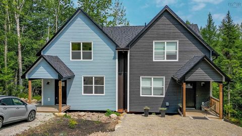 Welcome to Mahone Bay Gardens, designed in the charming spirit of an English Country Cottage. Ideally situated just a short walk from all town amenities, this unit offers a large open-concept main level featuring a contemporary kitchen and a convenie...