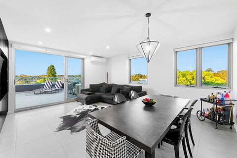 Discover this rare opportunity to own a unique north-facing penthouse in vibrant Strathfield. This stunning residence combines luxurious living in a prime location, offering expansive outdoor terrace style balcony with city and district views, perfec...