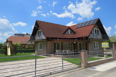 The Beach House is located in the village of Balatonlelle, on a dead-end street near Lake Balaton. In this quiet environment you can relax, enjoy the sunshine and take a refreshing dip in the Balaton, which is just 30m away. In the garden there is a ...