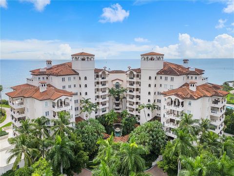 ENJOY THE ULTIMATE IN RESORT LIVING WITHIN THE PRIVATE ENCLAVE OF FISHER ISLAND! PANORAMIC OCEAN VIEWS FROM ALL ROOMS OF THIS SPACIOUS 4BDRM/5 BATH RETREAT (4TH BDRM NOW USED AS DEN W/ENSUITE BATH). FOYER ENTRY/MARBLE FLOORS/EXPANSIVE LIVING & DINING...