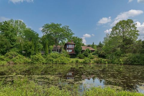 Sun-drenched, cedar contemporary merges architectural innovation and carefully curated period details. Sited on 82.5 acres that reflect Dutchess County's storied farming history, it's 90 easy miles from Manhattan and minutes to Rhinebeck and Red Hook...