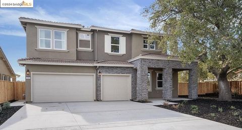 Welcome to this meticulous, former model home located in the heart of Oakley. This modern masterpiece features 5 spacious bedrooms, 4 full bathrooms & offers over $100k in premium upgrades throughout the entire 2,972 square feet of sophisticated livi...