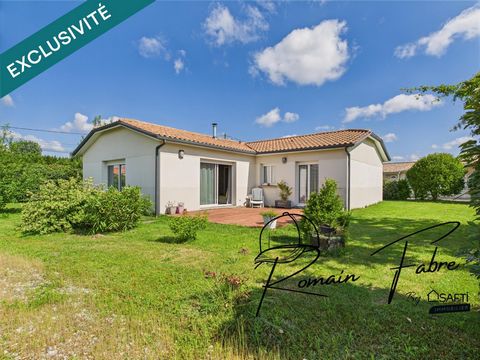 Maison en L de plain-pied avec 3 chambres , garage et très beau terrain