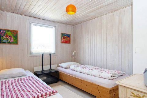 A holiday cottage with sauna located on a plot with a view of the sea in a quiet holiday cottage area approx. 200 metres from the water. There is an open and a covered terrace with outdoor furniture by the house. Walls and ceiling consists of bright ...
