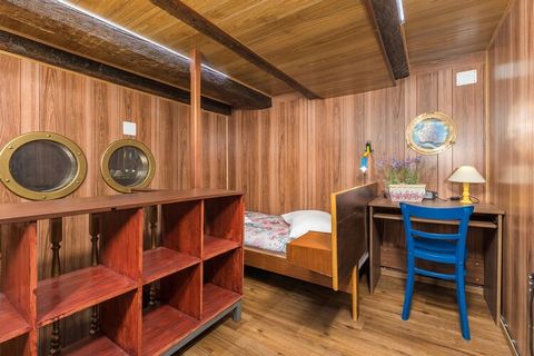 This cozy ground-floor apartment, located in the heart of Cres, offers a unique nautical-themed design, reminiscent of a yacht's lower deck. The apartment features three bedrooms, two bathrooms, and a fully equipped kitchen, making it an ideal choice...