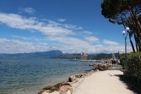 With 2 bedrooms, this is a holiday home in the beautiful, atmospheric town of Lazise. After returning from excursions, you can take a refreshingly cool dip in the shared swimming pool. This stay is suitable for 5 persons, be it a family or a group of...