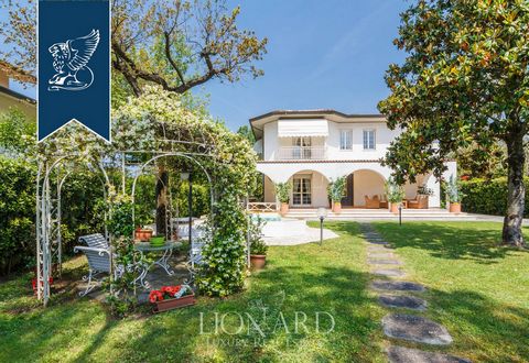 In the center of Forte dei Marmi, not far from the beach, there is this luxury villa for sale. This two-storey luxury home for sale measures 216 m2 and features wide and very bright rooms and is surrounded by a well-kept garden measuring 900 m2, home...