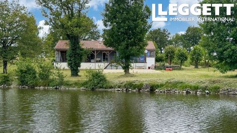 A30202NHA79 - Living the dream is possible with this idyllic lakeside property. Imagine relaxing on the banks of your own private lake or enjoying the stunning view from the terrace at the front of the house. This picturesque setting provides the per...