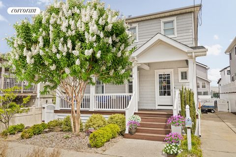 204-34 9th Avenue is a renovated four bedroom, two-and-a-half-bathroom home with private driveway. This charming home offers a pretty front garden, large covered front deck and a huge backyard! Upon entering you are immediately struck by beautiful ha...