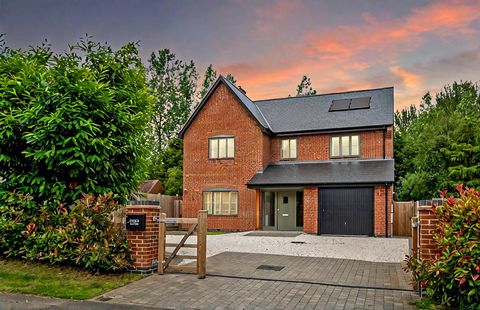 Rowan House was constructed to a high specification in 2022 and offers four double bedrooms including a principal bedroom suite with its own private balcony overlooking the gardens and woodland at the rear. There are two ensuite shower rooms that hav...