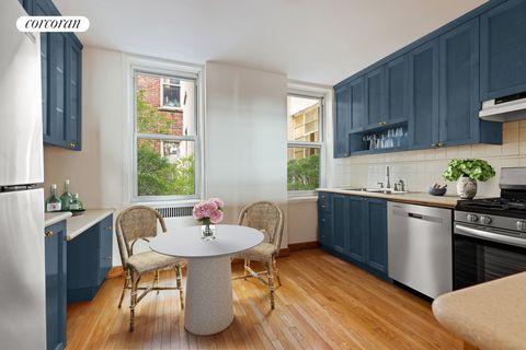 This distinguished Georgian Revival building, situated in the coveted Upper East Side, was constructed in 1939 and upgraded in 1984. Nestled quietly at the rear of the building and overlooking the serene gardens of East 87th Street brownstones, resid...