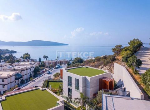 Appartements élégants avec jardins et vue sur la mer à Kumbahçe, Bodrum Les appartements élégants avec vue sur la mer sont situés dans le quartier de Kumbahçe, le centre du district de Bodrum. Bodrum, l'un des lieux de vacances les plus célèbres au m...