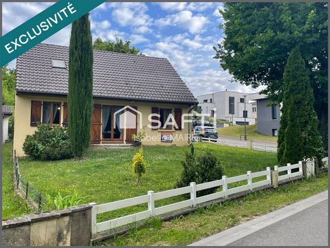 Maison individuelle avec véranda, garage et jardin