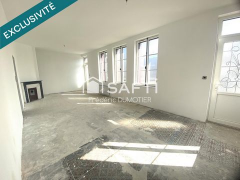 Maison avec de beaux volumes, composée de 4 chambres et un jardin