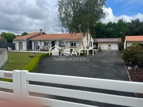 Maison familiale de plein-pied de 142 m2 avec Véranda et garage attenant.