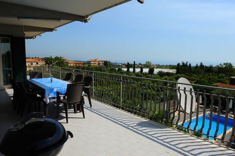 Relaxed Living in the Heart of Sicily Tucked on the slopes of Mount Etna, this beautifully air-conditioned apartment offers a peaceful retreat with a spacious terrace, a garden for lounging, and a saltwater swimming pool shared with only two other un...