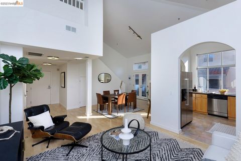 NEW PRICE! Chic & sunny loft-style condo with soaring ceilings and glorious natural light. Expansive 2-level floor plan is approximately 1050 sq. feet. The spacious layout is ideal for entertaining, creative endeavors, workspace, or simply relaxing. ...