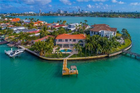 Exquisite home on cul de sac of a gated street on a peninsula in Miami Beach. This 5/3.5 home offers safety, privacy and breathtaking wide bay views of Biscayne Bay and Indian Creek Island. Deep water access with no bridges to bay and a dock with roo...